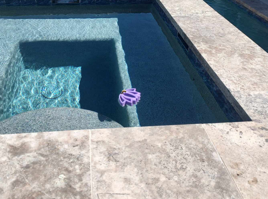 Lotus Flower Bee Raft floating in spa water to help bees drink safely